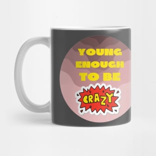 Young enough to be crazy Mug